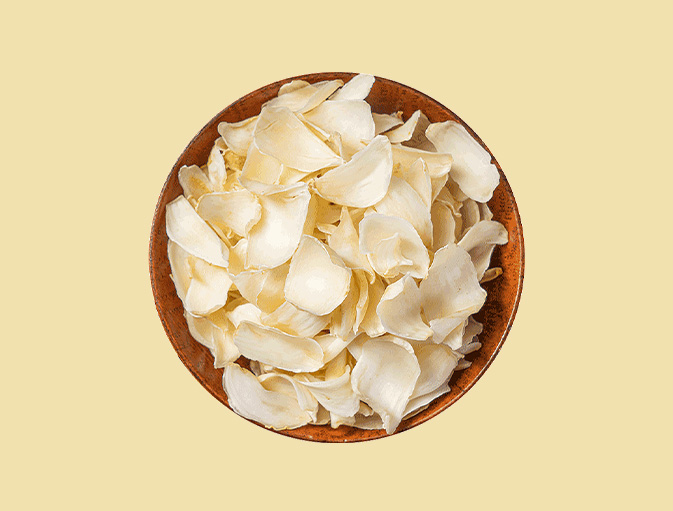 Dehydrated garlic flake with root 